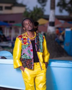 Barhama leaning on boat